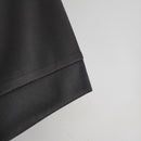 Detalhe da barra do AC Milan Away 11/12 Retro Olympic, mostrando o tecido e acabamento.