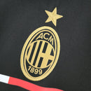 Emblema do AC Milan Away 11/12 Retro Olympic com bordado em dourado e estrela acima.