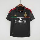 Camisa AC Milan Away 11/12 retro, modelo com detalhes em vermelho e logo da Emirates.