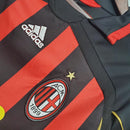 Camisa AC Milan Home 06/07 Retro OLYMPIC com detalhes em vermelho e preto e logotipo da Adidas.