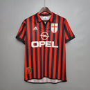 Camisa AC Milan Home 99/00 Retro Olympic com listras vermelhas e pretas, logo Opel e detalhes em bordô.