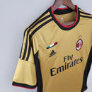 Camisa AC Milan Third 13/14 retro amarela com detalhes em preto e logo da Adidas.