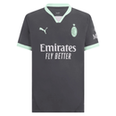 Camisola AC Milan third 24/25 preta com detalhes em verde e logo da Puma.