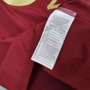 Etiqueta de produto da camisa Arsenal Away 05/06 Retro Olympic Store com instruções de cuidado.