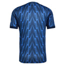 Camisa Arsenal away 25/26 com padrão azul e detalhes em relâmpago, disponível na Olympic Store.