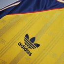 Camisa Arsenal Retro 1988/1989 em amarelo e azul com logo Adidas, destacando a herança do clube.