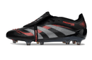 Chuteira Adidas Predator Elite FG Tongue Preta e Vermelha com design arrojado e tecnologia avançada.