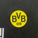 Logo do Borussia Dortmund em destaque no uniforme 96/97 da equipe.