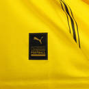 Camisa Borussia Dortmund 24/25 com logotipo da Puma, destaque para a etiqueta AUTHENTIC LICENSED FOOTBALL.