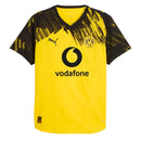 Camisa Borussia Dortmund home 25/26 em amarelo e preto com logo e patrocinador.