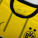 Camisa oficial Borussia Dortmund 24/25, com detalhes em preto e logotipo da Puma na cor amarela.