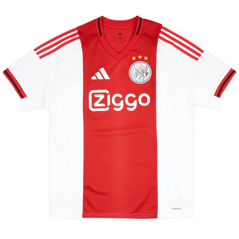 Camisola principal do Ajax 2025/26 Adidas em branco e vermelho com faixa central em padrão gradiente, gola em V e detalhes icónicos da cidade de Amesterdão.