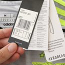 Camisola alternativa do SL Benfica 23/24 em cinzento, com detalhes em preto e amarelo, escudo em destaque e grafismos modernos no tecido.