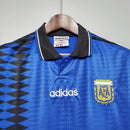 Camisola Argentina Home 94/95 Retro com detalhes em azul e preto, logo da AFA e marca adidas.