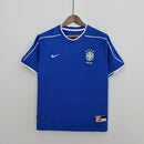 Camisola Brasil Away 1998 Retro na cor azul, com logo da Nike e estrelas, destaque para a Camisola Brasil.