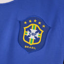 Emblema da Camisola Brasil Away 2006 Retro com detalhes em azul e amarelo.