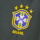 Camisola Brasil com logo CBF e estrelas, símbolo da seleção brasileira de futebol.