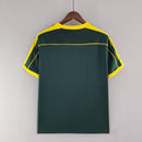Camisola Brasil Home 98/99 Retro na cor verde com detalhes em amarelo, vista traseira.