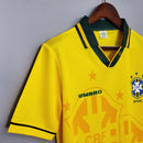 Camisola Brasil Home Jersey 1994 Retro em amarelo com detalhes em verde e logo da CBF.