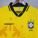 Camisola Brasil Home Jersey 1994 Retro em amarelo com detalhes em verde e logotipo da CBF.