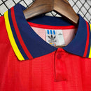 Camisola Espanha GK 1994 Retro com gola azul e detalhes amarelos e vermelhos.