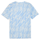 Camisa de pré-jogo Manchester City 25/26 com design em azul claro, ideal para torcedores.