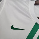 Camisola Portugal Away 2012 Retro com detalhes em verde e logo Nike visível.