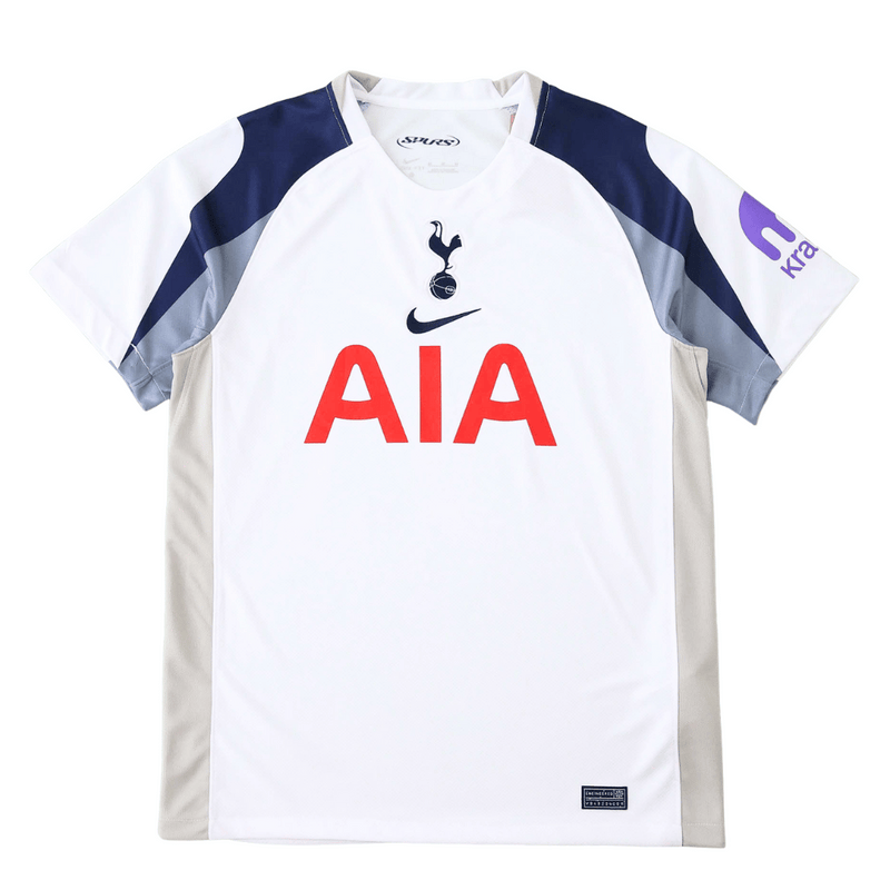 Camisola do Tottenham Hotspur Principal 2025–2026, branca com detalhes em azul-marinho e cinzento, escudo centralizado e design moderno da Nike.