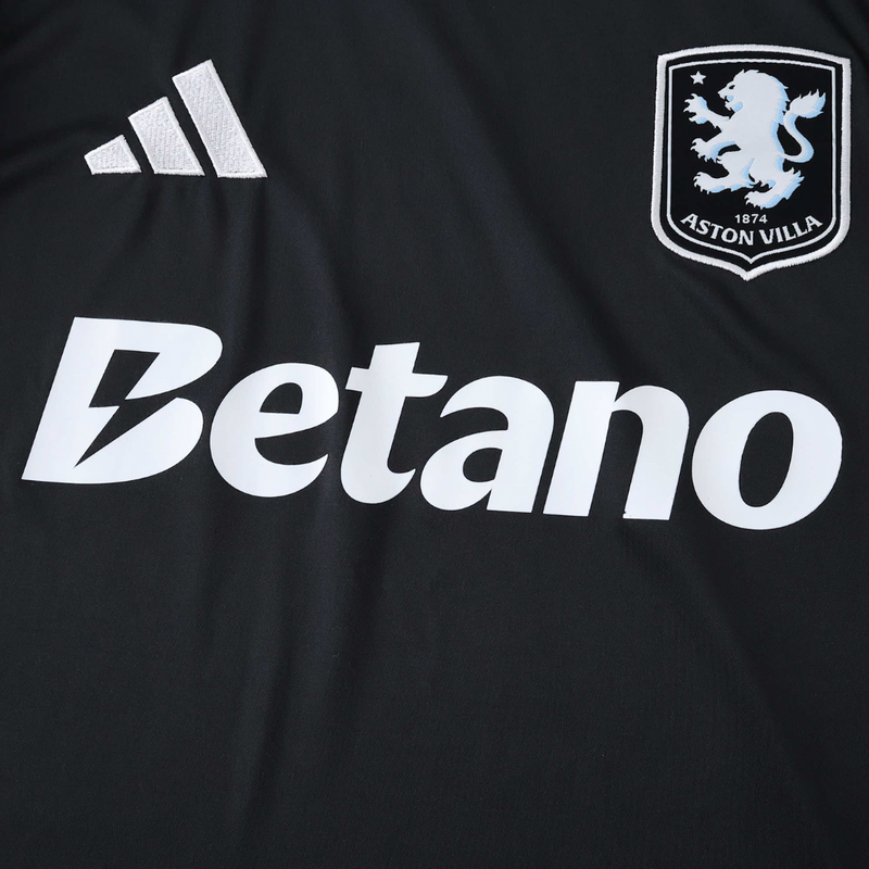 Camisola secundária Aston Villa 2025/26 Adidas masculina, preta com mangas cinzentas e detalhes em azul-celeste, escudo e logótipos em branco.