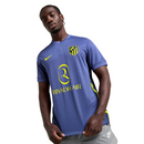 Camisola secundária do Atlético de Madrid 2025/26 da Nike em roxo com raios amarelos e selo “ATLETI – Not Turning Back” na gola, vista frontal.