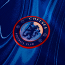 Emblema do Chelsea home 24/25 Azul Olympic, destacando o logo do Chelsea Football Club.