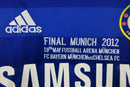 Camisa do Chelsea Home da temporada 11/12, destacando detalhes do jogo final de Munich 2012.