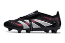 Chuteira Adidas 25 Predator Elite Tongue FG em preto e vermelho, ideal para desempenho em campo.