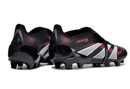 Chuteira Adidas 25 Predator Elite Tongue FG em design preto e vermelho, ideal para desempenho em campo.