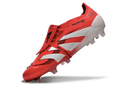 Chuteira Adidas 25 Predator Elite Tongue FG em design vermelho e branco, com língua tradicional e tecnologia de ponta.