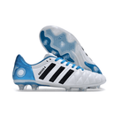 Chuteira Adidas AdiPure 11 Pro FG Branca e Azul - Toni Kroos em ângulo lateral, com detalhes em preto e azul.