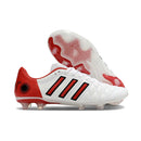 Chuteira Adidas AdiPure 11 Pro FG Branca e Vermelha com detalhes em preto e fundo branco.