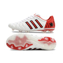 Chuteira Adidas AdiPure 11 Pro FG Branca e Vermelha lateral com solado visível