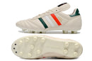 Chuteira Adidas Copa Mundial FG Bege, Vermelha e Preta com solado para futebol em gramados naturais.