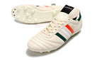Chuteira Adidas Copa Mundial FG Bege, Vermelha e Preta com design tricolor e solado para gramados naturais.