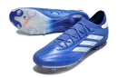 Chuteira Adidas Copa Pure+ FG Azul com design vibrante e ajuste responsivo para desempenho em campo.