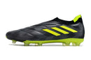 Chuteira Adidas Copa Pure+ FG Preta e Verde com design moderno e tecnologia avançada