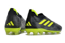 Chuteira Adidas Copa Pure+ FG Preta e Verde com design moderno e tração FG para controle no campo.