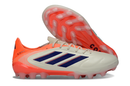 Chuteira Adidas Copa Pure III Elite AG - Coral Blaze Pack com sola AG para relvados sintéticos.