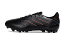 Chuteira Adidas Copa Pure III Elite AG - Preta em perfil, design avançado e sola para relvados sintéticos.