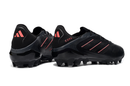 Chuteira Adidas Copa Pure III Elite AG - Preta com design vibrante e sola para relvados sintéticos.