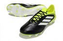 Chuteira Adidas Copa Pure III Elite FG - Preta e Amarela com detalhes em amarelo e sola FG para excelente desempenho em campo.