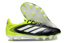 Chuteira Adidas Copa Pure III Elite FG - Preta e Amarela, com design elegante e sola FG para máximo desempenho em campo.