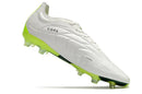 Chuteira Adidas Copa Pure+ FG Branca e Verde com design moderno e tecnologia avançada.