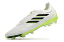 Chuteira Adidas Copa Pure+ FG Branca e Verde em ângulo lateral, destacando seu design moderno e elegante.